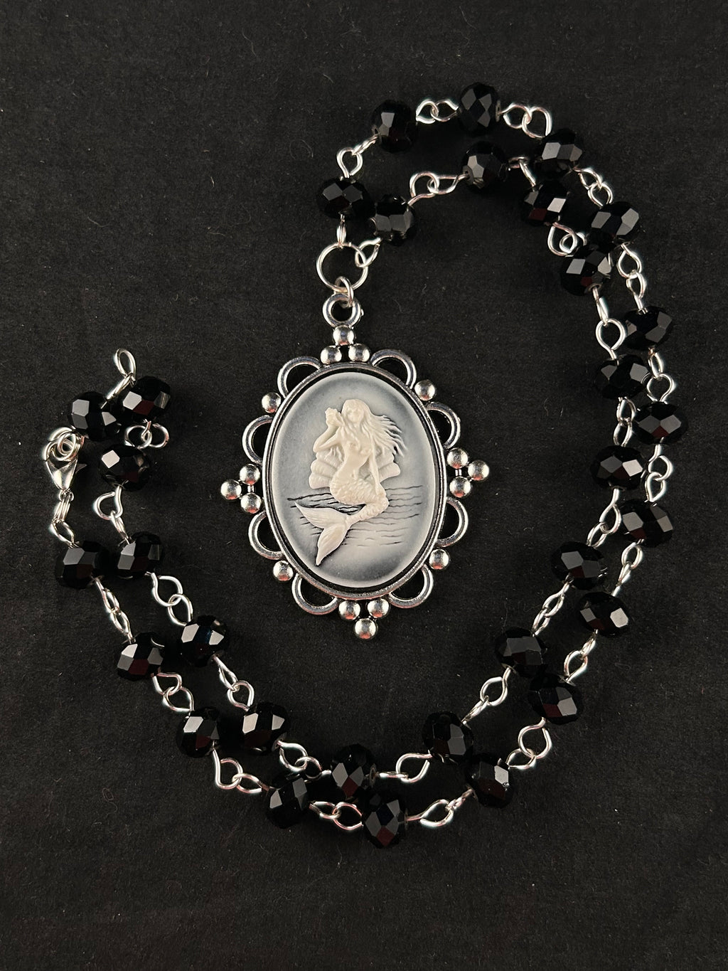 Siren (white, black, and silver)