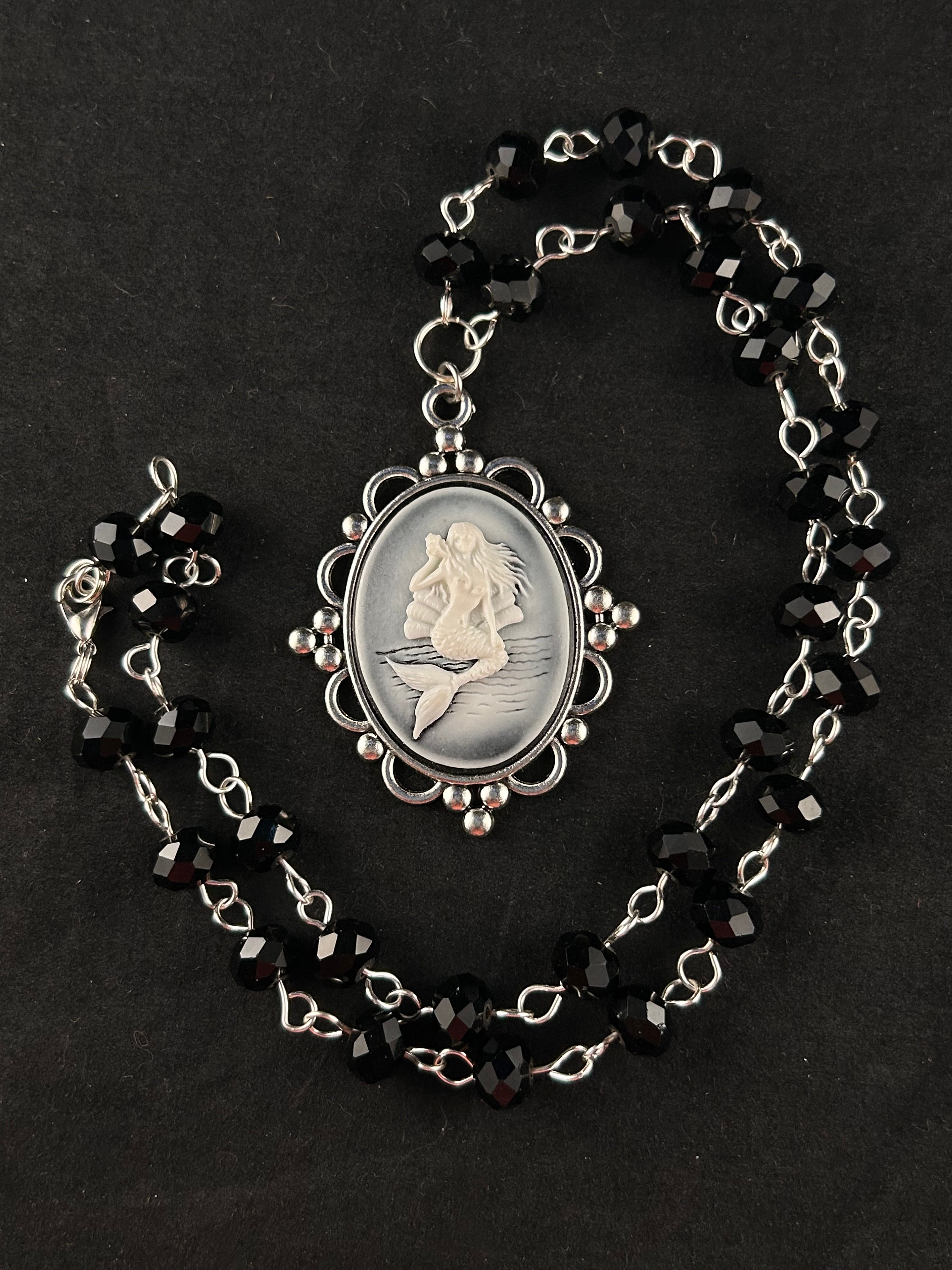 Siren (white, black, and silver)