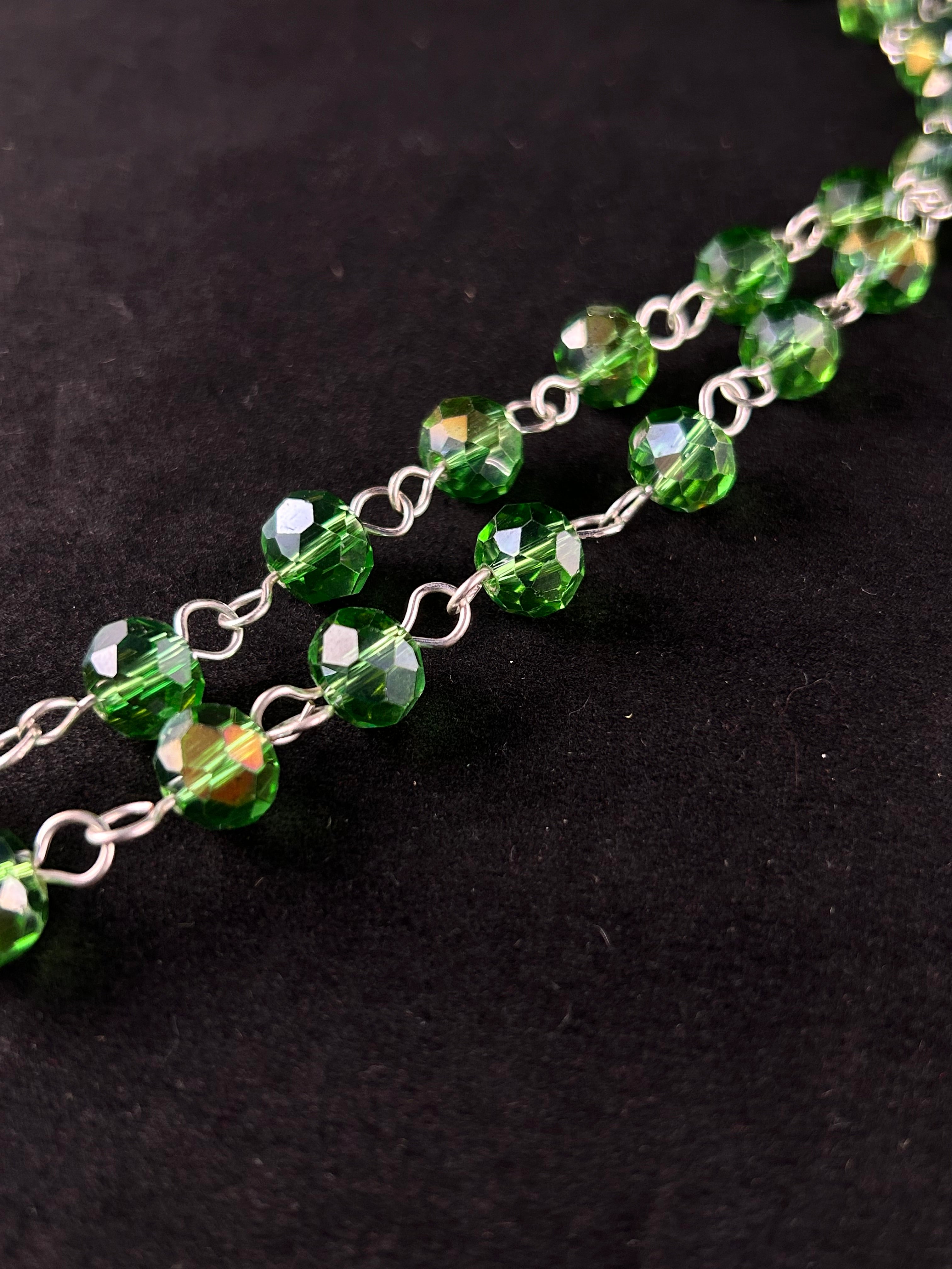 Siren (beige, sea green, and silver)”