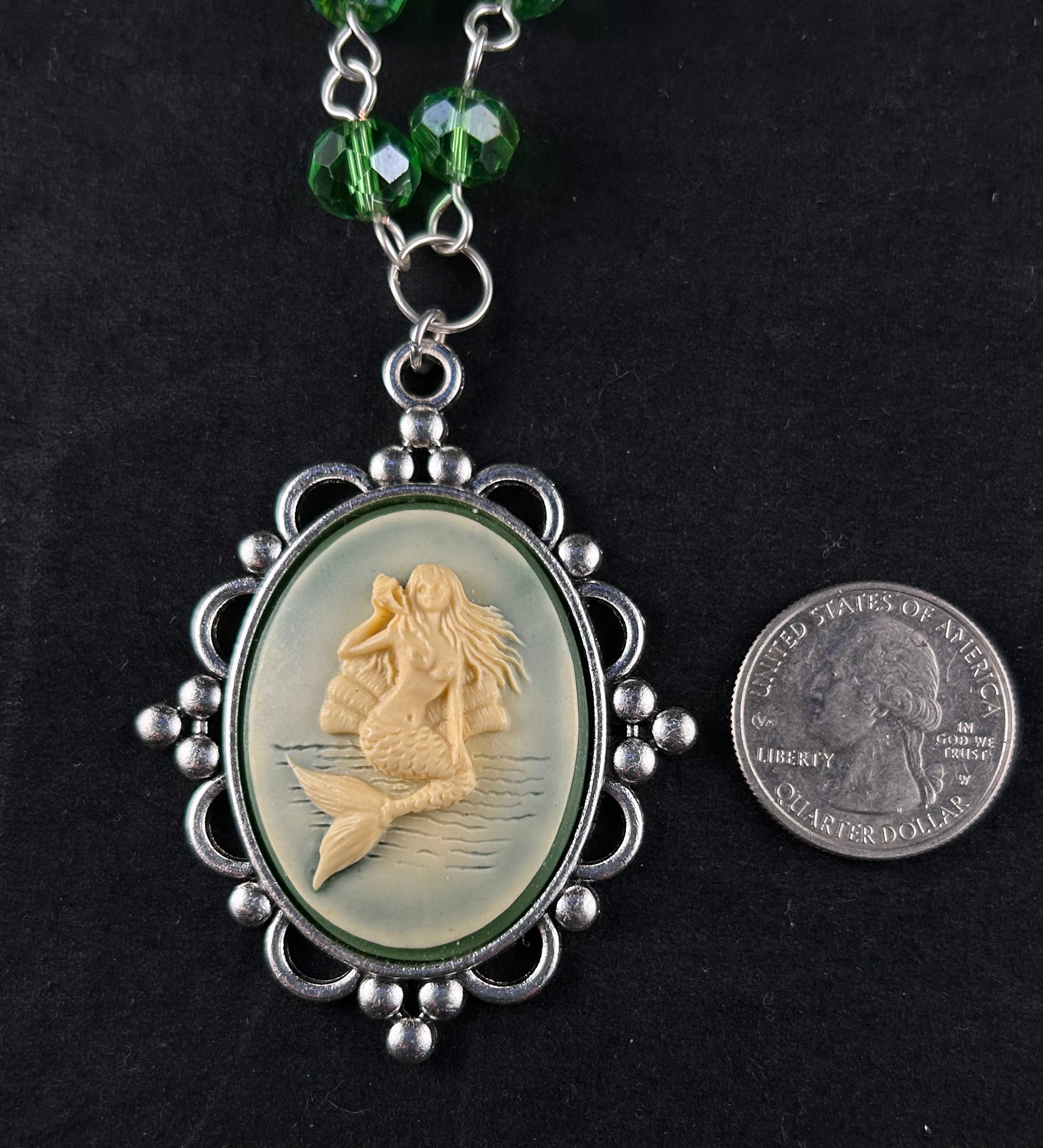 Siren (beige, sea green, and silver)”